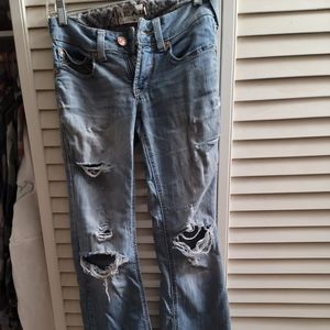 Real Ariat denim jeans size 26R length 30" naturally worn holes